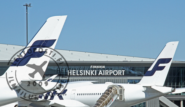 fin_tails_HELAirportsign